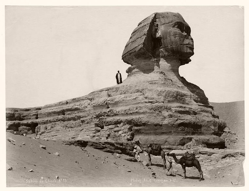This Scientific Study States the Sphinx May Be Up to 800,000 Years Old A-man-standing-on-the-shoulder-of-the-Great-Sphinx.-Notice-the-size-of-the-monument.